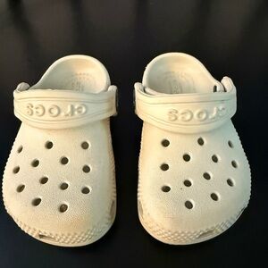 Toddler crocs - size 5c (tan / bone color). Gently worn.